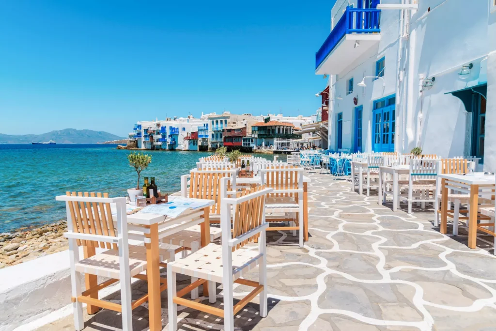 A charming seaside restaurant overlooking the sea in Mykonos, Greece