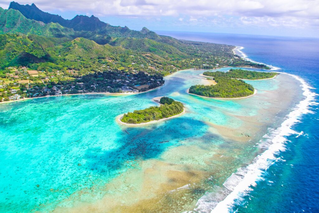 Aerial view of a lagoon and islets in the Cook Islands