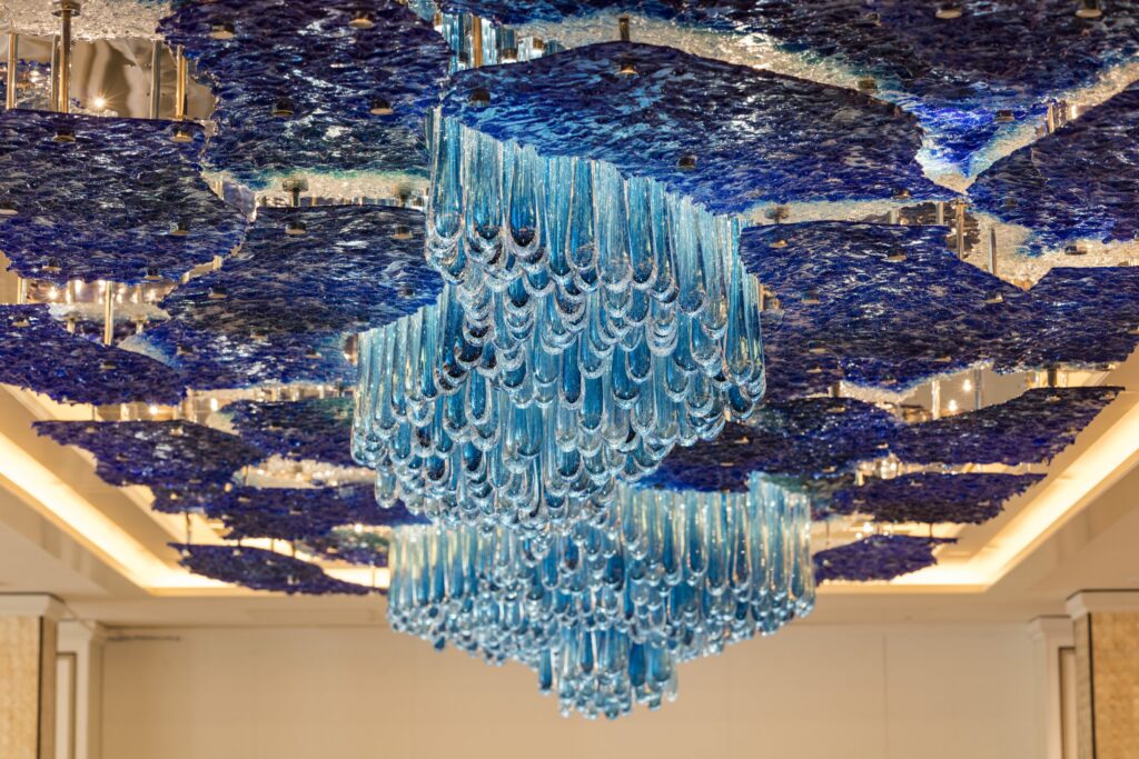 Crystal chandelier in Compass Rose restaurant aboard Regent Seven Seas