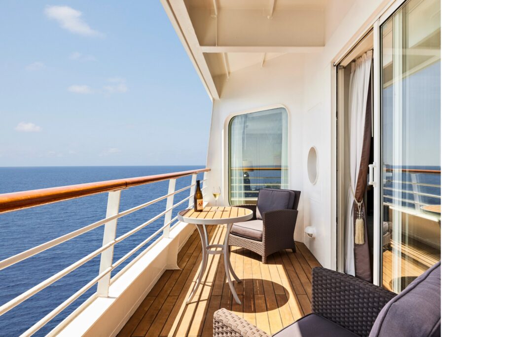 Crystal Serenity veranda with lounge chairs overlooking the sea