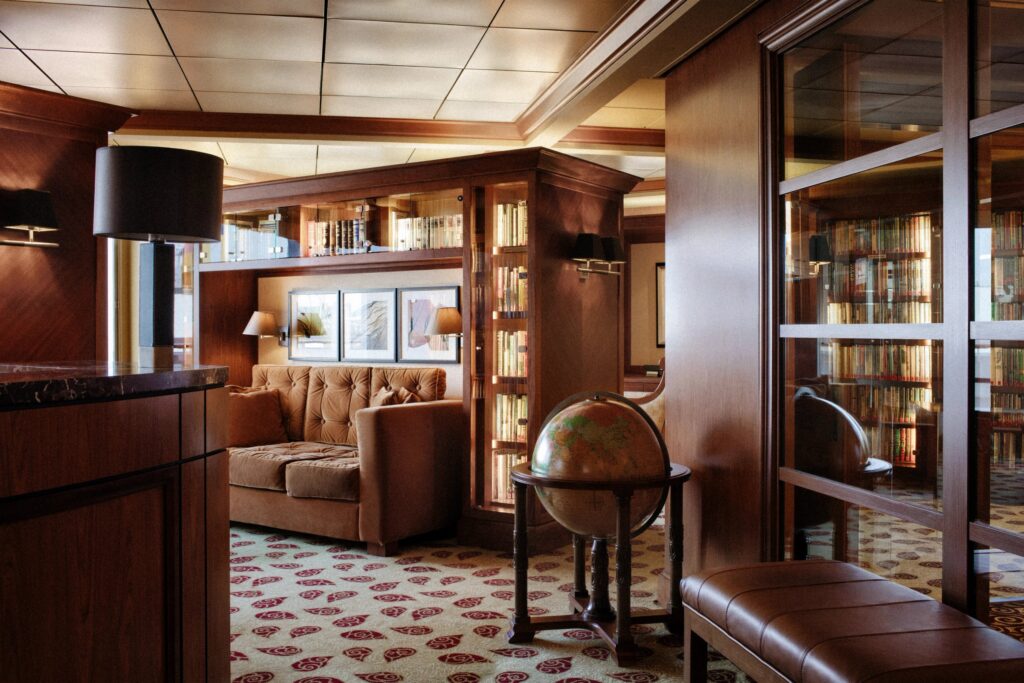 Crystal ship library with bookshelves and reading chairs