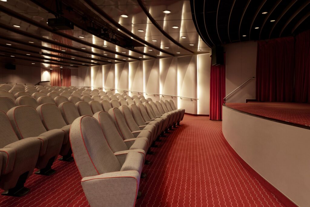 Hollywood Theatre with red seating aboard Crystal