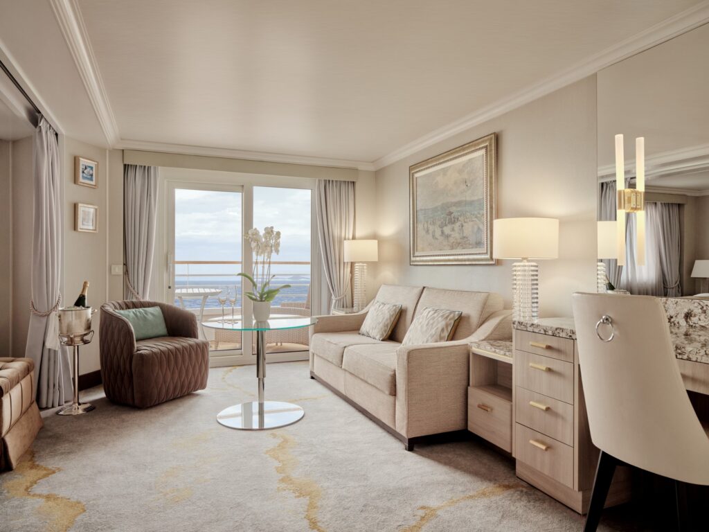 Refurbished Crystal Symphony suite sitting area with ocean-view windows