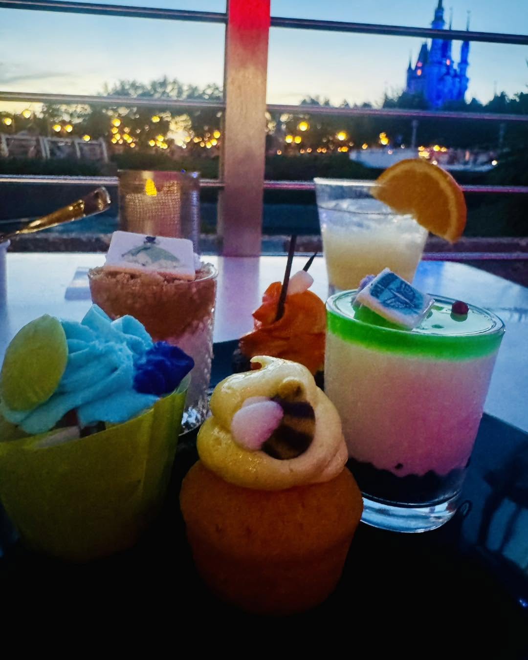 Colorful drinks with a view of Cinderella Castle at Walt Disney World Colorful drinks with a view of Cinderella Castle at Walt Disney World