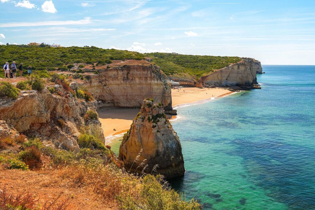 Golden sea cliffs and beach on Portugal's Algarve coast