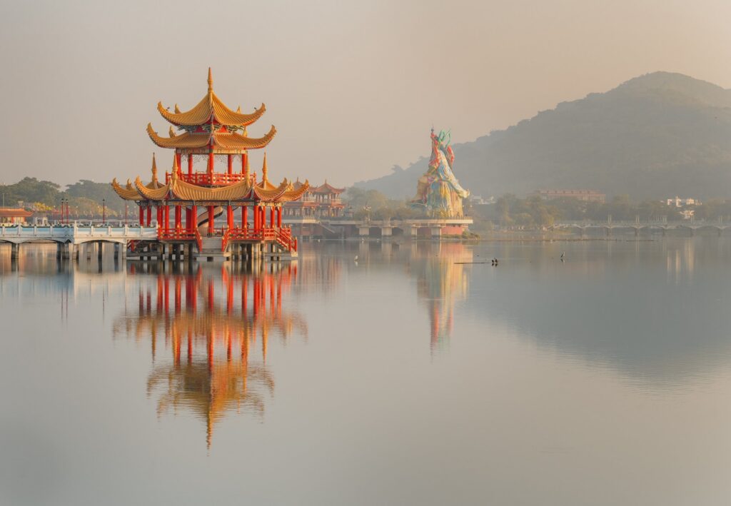 Pagoda reflected in calm water in East Asia
