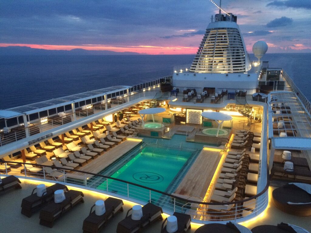Pool deck at dusk aboard Regent Seven Seas Explorer