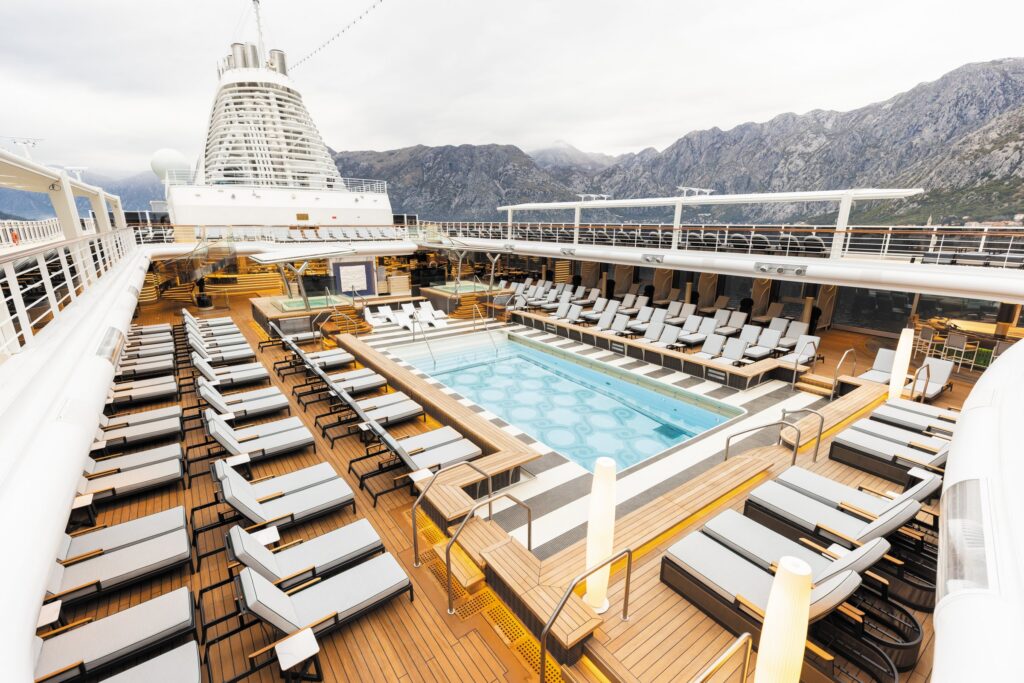 Pool deck with loungers aboard Regent Seven Seas Grandeur