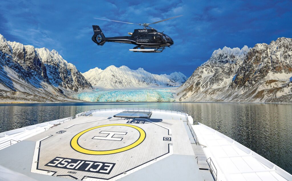 Scenic helicopter flying over Svalbard