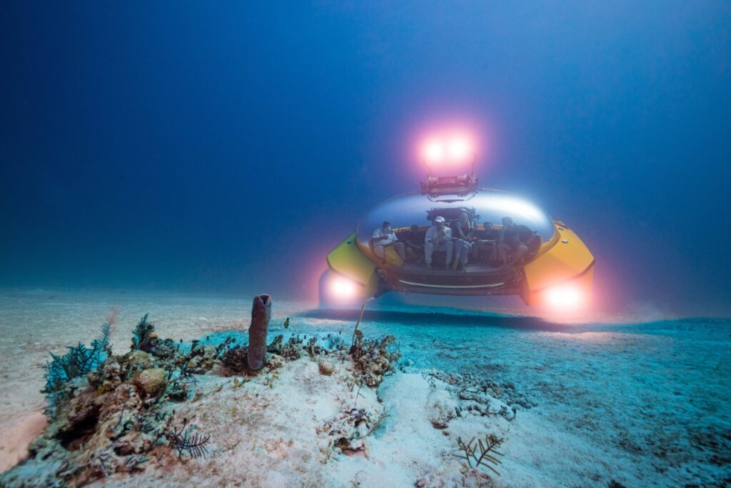 Scenic Neptune submarine exploring underwater