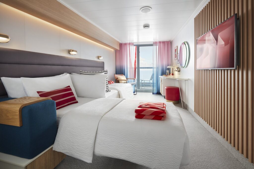 Sea Terrace cabin with double bed aboard Virgin Voyages