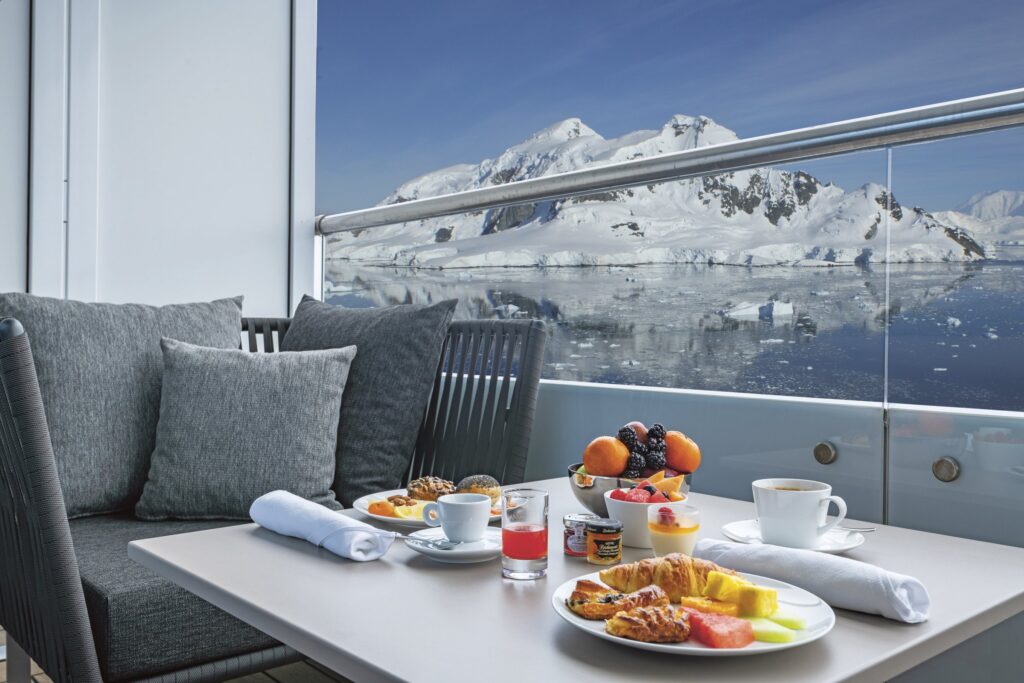Suite balcony breakfast with Antarctic views aboard Scenic Eclipse