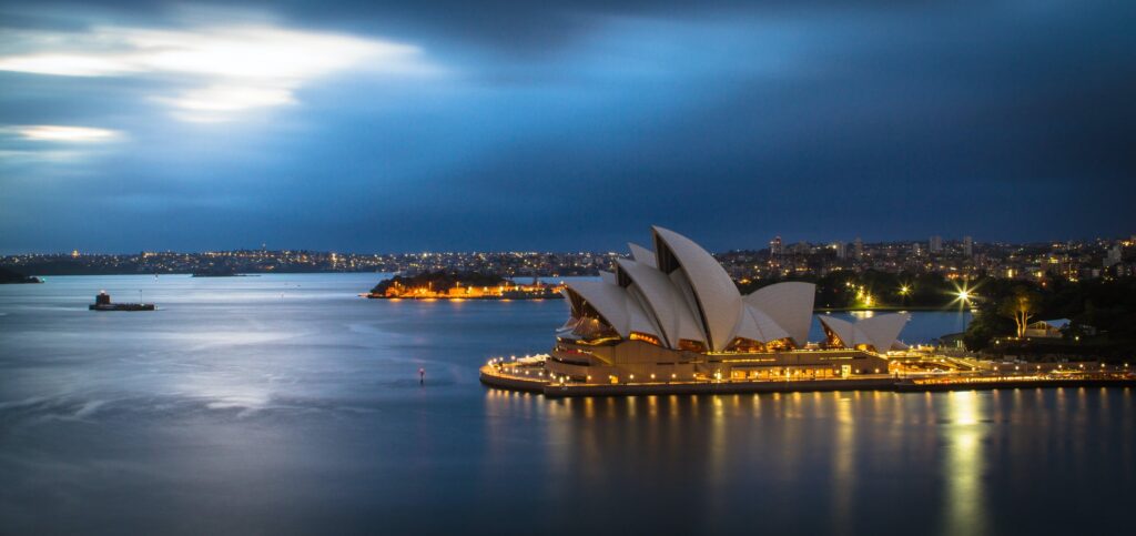 Sydney Opera House and harbor at dusk, Australia