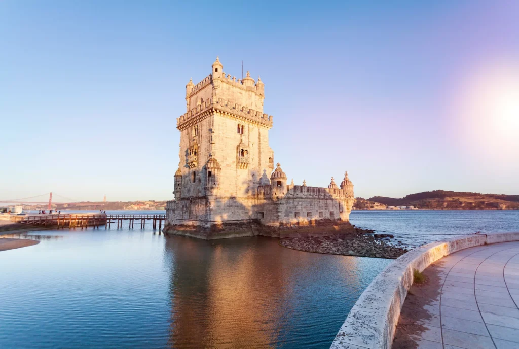 The Belem Tower by the Tagus River at sunset in Lisbon, Portugal