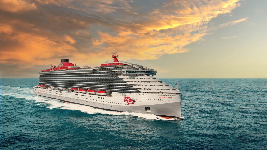 Valiant Lady sailing at sunset